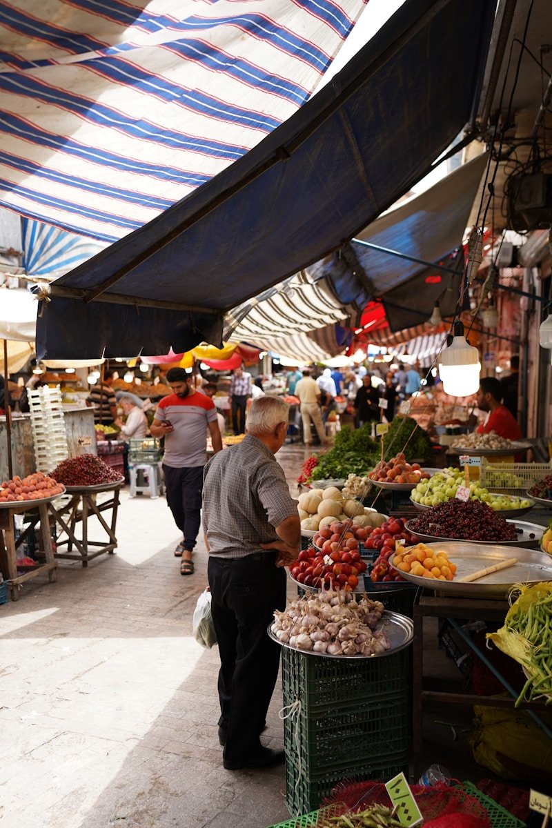 people shopping at a farmers market